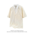 Men's black padded polo shirt sweater with a heavy Henry collar and short sleeves