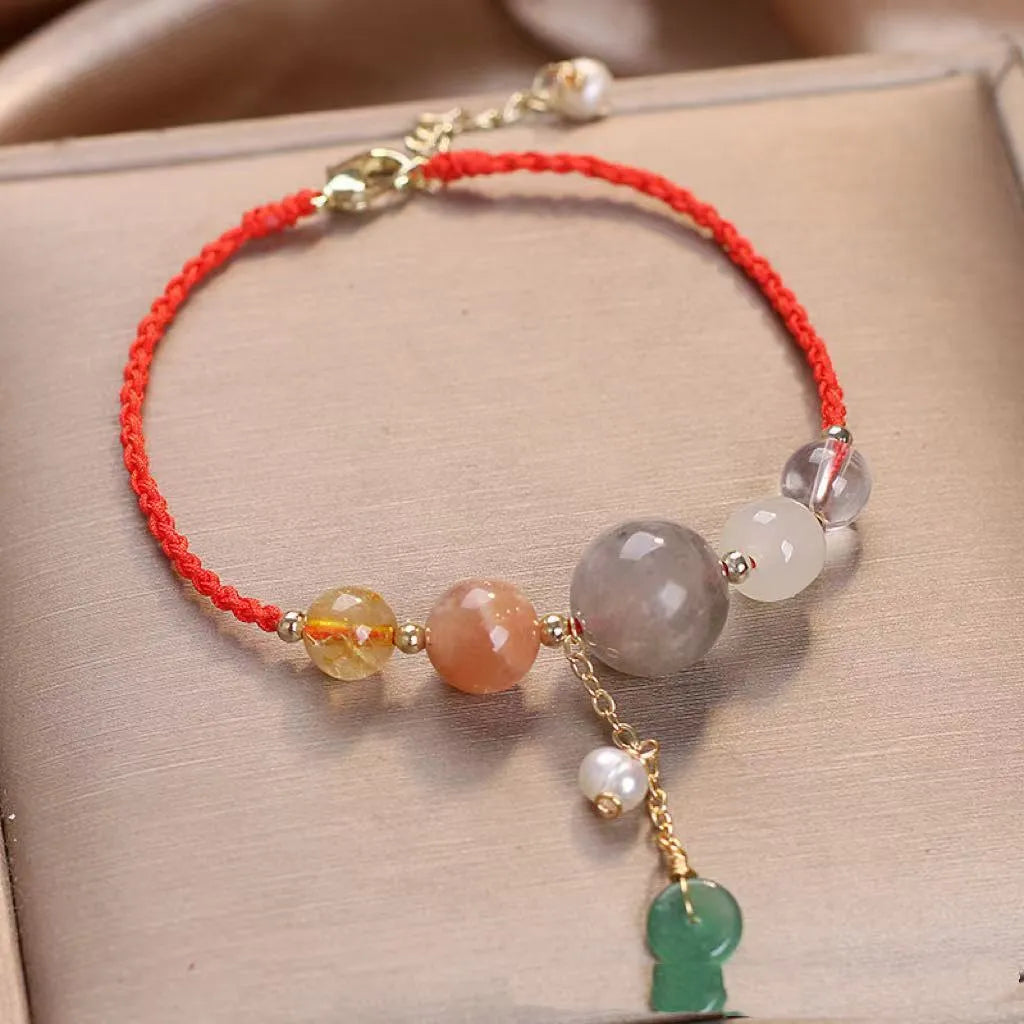 Hand-woven women's bracelet with peace buckle design in crystal material with sequin detailing