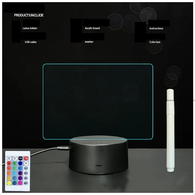 Black 3D acrylic LED night light and message board with stylus on a desktop