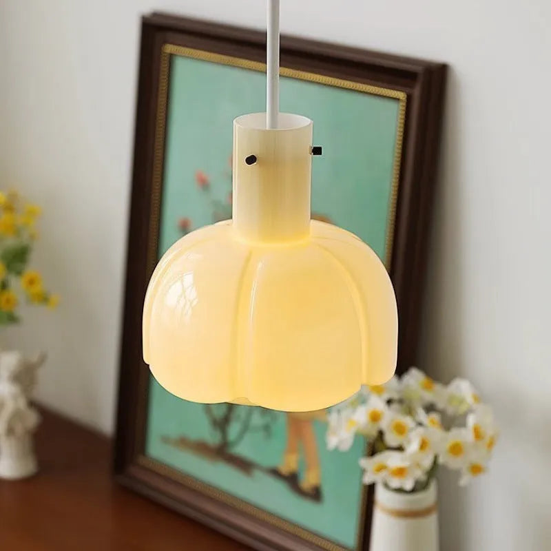 Medieval brass chandelier with six glass bud pendants in retro dining room lighting