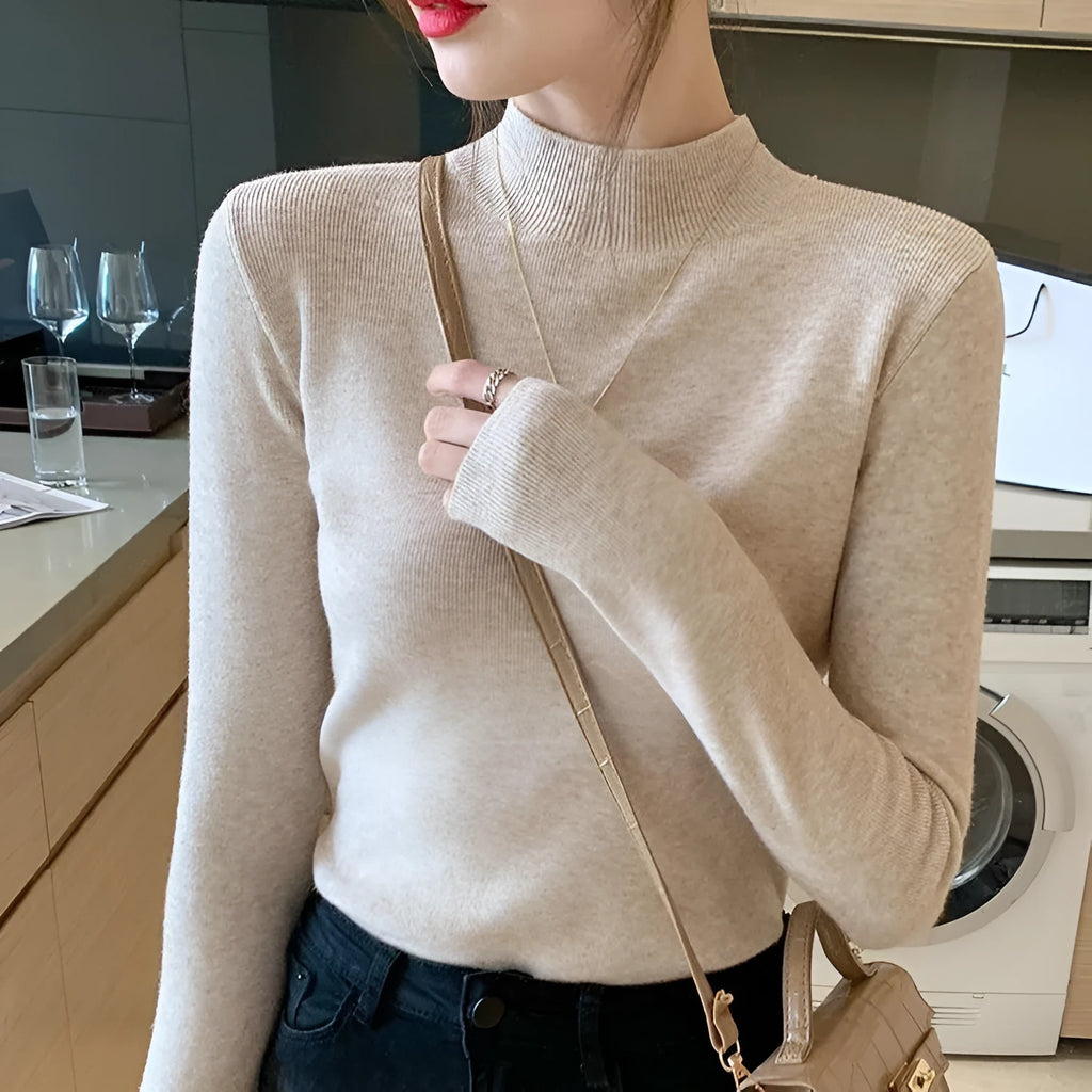 Slim fit long sleeve knitted shirt in viscose fibre shown in apricot colour