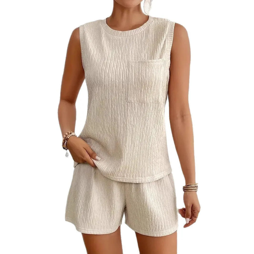 Women's apricot sleeveless vest and matching shorts set laid flat.