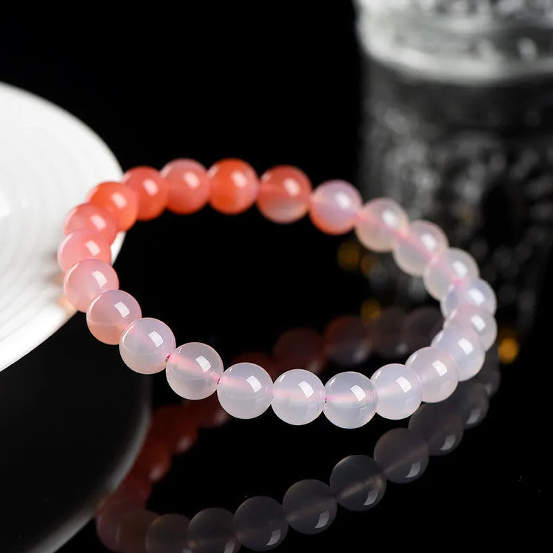 Yanyuan agate bracelet showing gradient salt source colour on wrist, with geometry style beads.