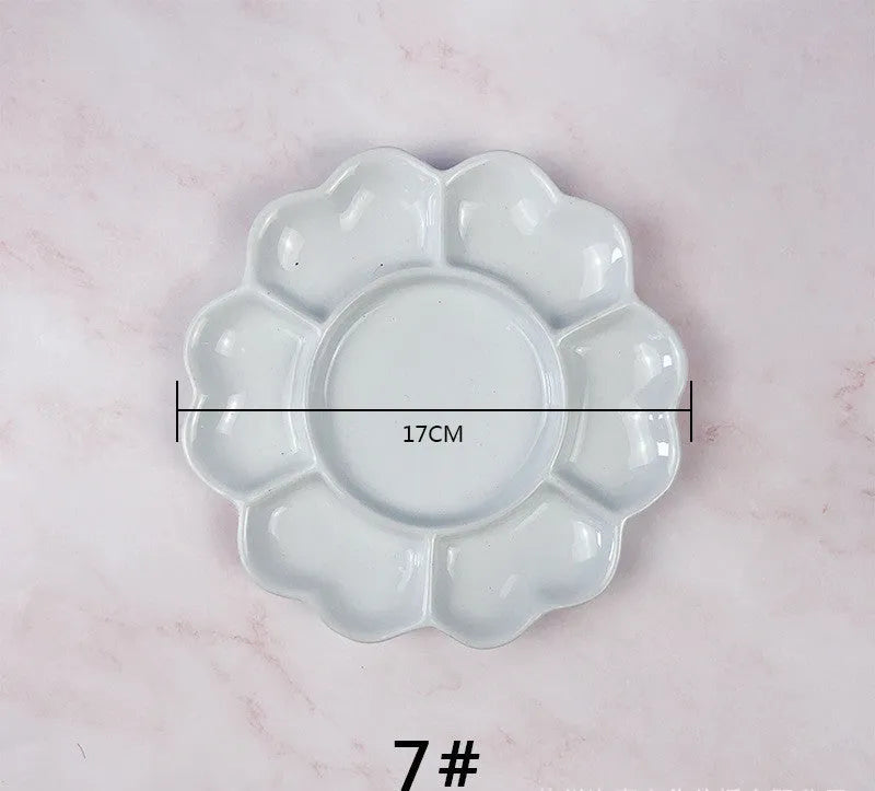 White ceramic plum blossom shaped artist palette for oil, watercolour and acrylic painting
