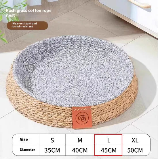 Rattan woven cat nest bed for pets, shown in a natural colour.