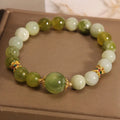 Women's original design jade bracelet in Xiuyan green colour with mori style aesthetic