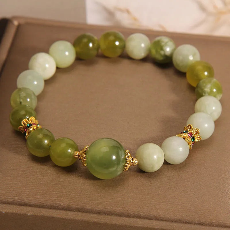Women's original design jade bracelet in Xiuyan green colour with mori style aesthetic