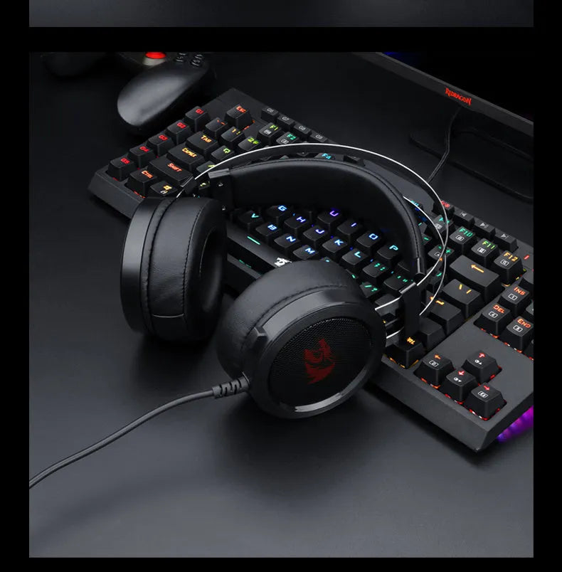 Black wired computer gaming headset with a long cable and a 3.5mm audio jack plug