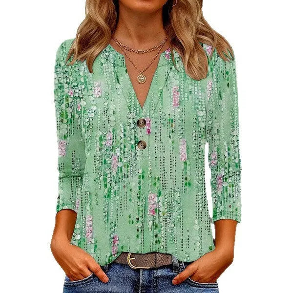 Women's loose fit V-neck top with a 3D pattern print in a casual pullover style.