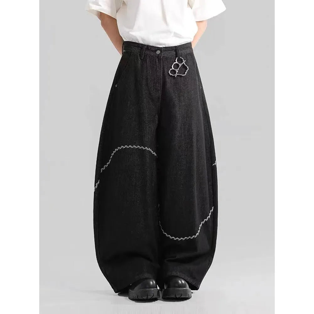 Men's black straight-leg jeans with a mid-waist design and zip fly, made from micro-elastic polyester denim.