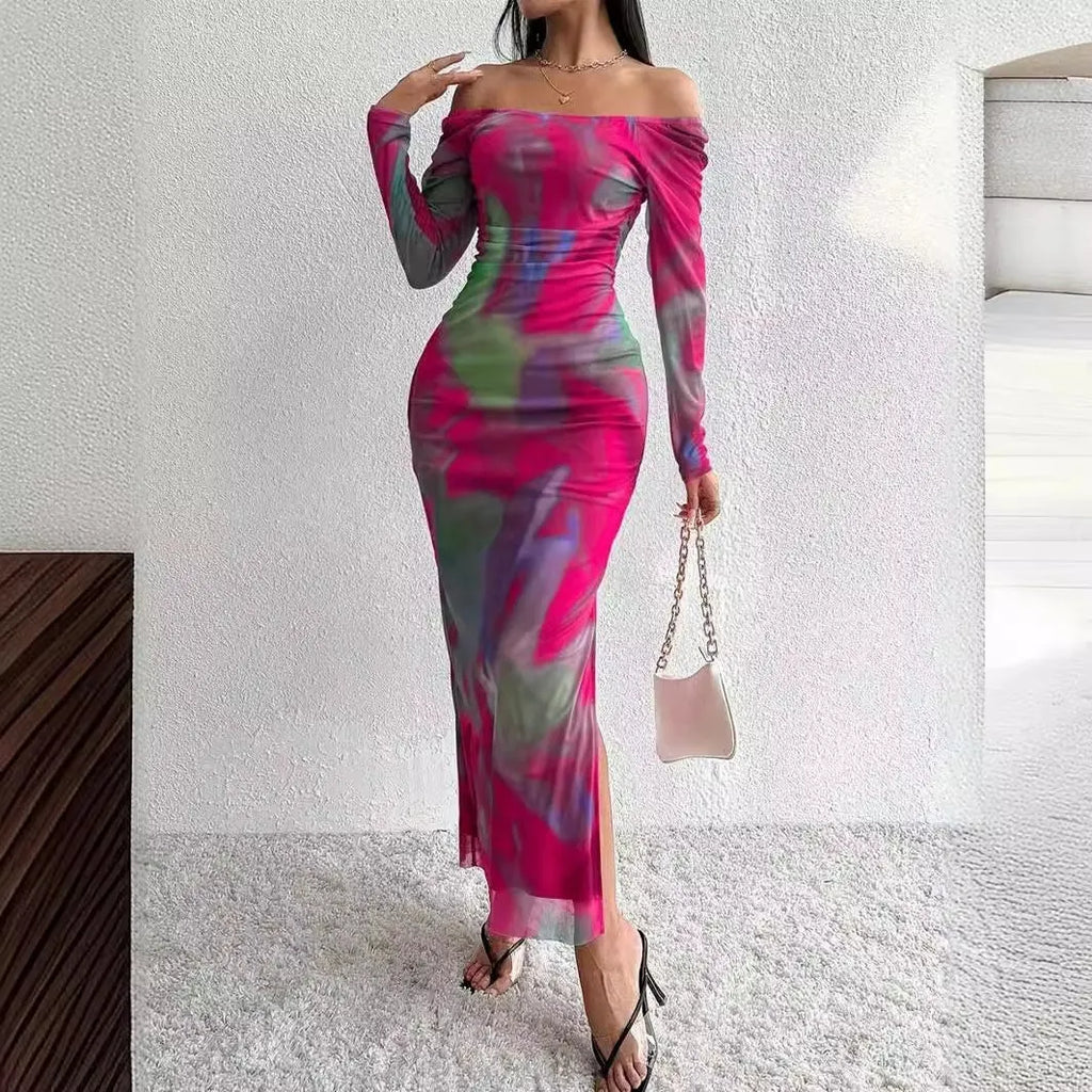 Long green gradient fishtail mesh dress with a square collar and pleated detailing on a mannequin.
