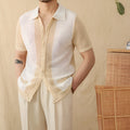 Beige short-sleeved lapel cardigan made from a thin linen and cotton knit fabric.