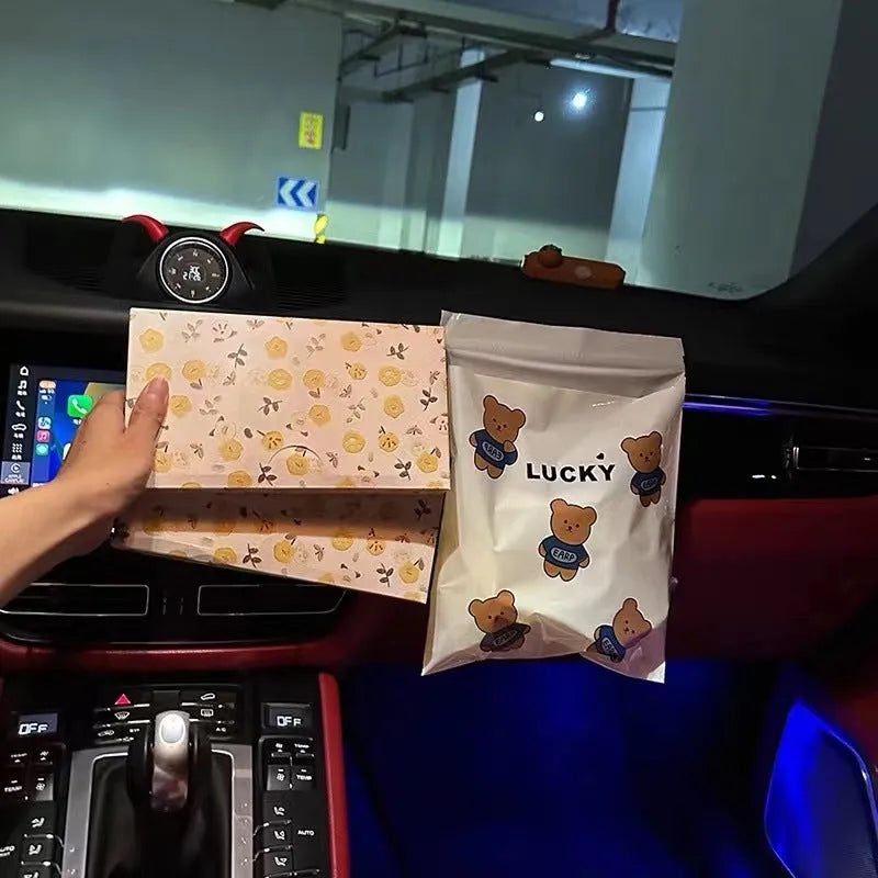 PE car trash adhesive clean bag with flat top design, available in Lucky Bear and Rabbit styles, 20 or 40 pieces.