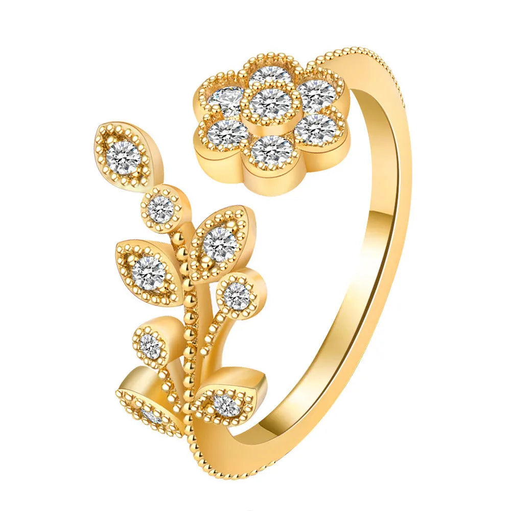 Women's copper open ring with white and gold flower leaf design and diamond style finish