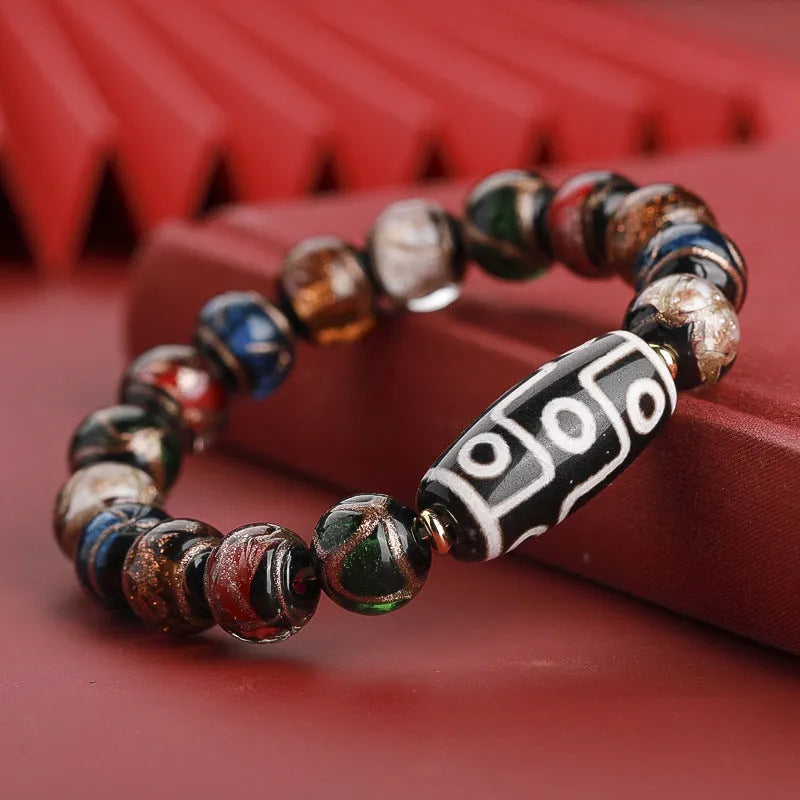 Traditional Chinese coloured glaze bracelet with year snake and lucky bead elements in ancient five-colour design