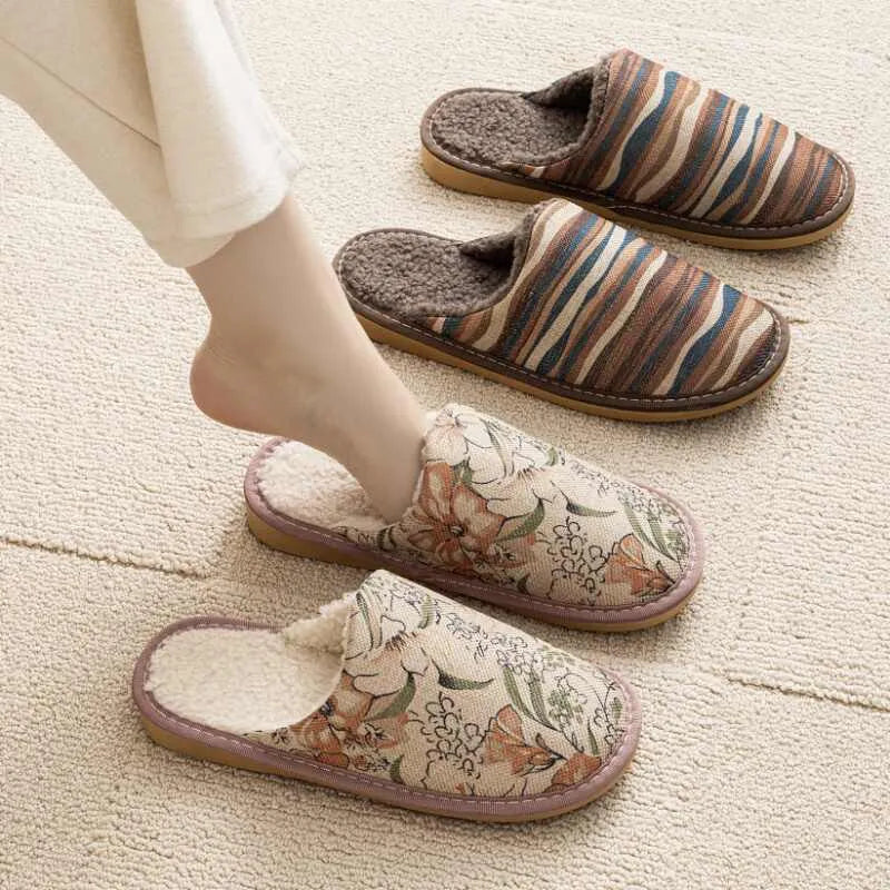 A pair of cotton household slippers with a linen surface and PVC sole in one of six colour options.