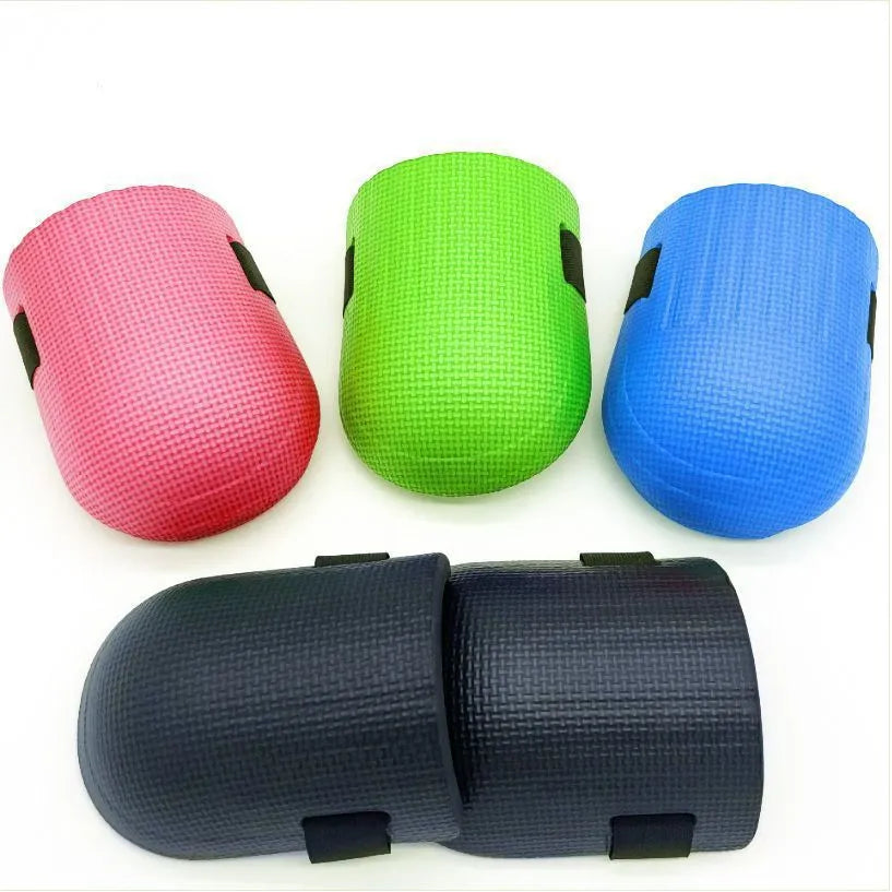 A pair of foam kneecap pads in blue colour, showing their shape and thickness for knee protection.
