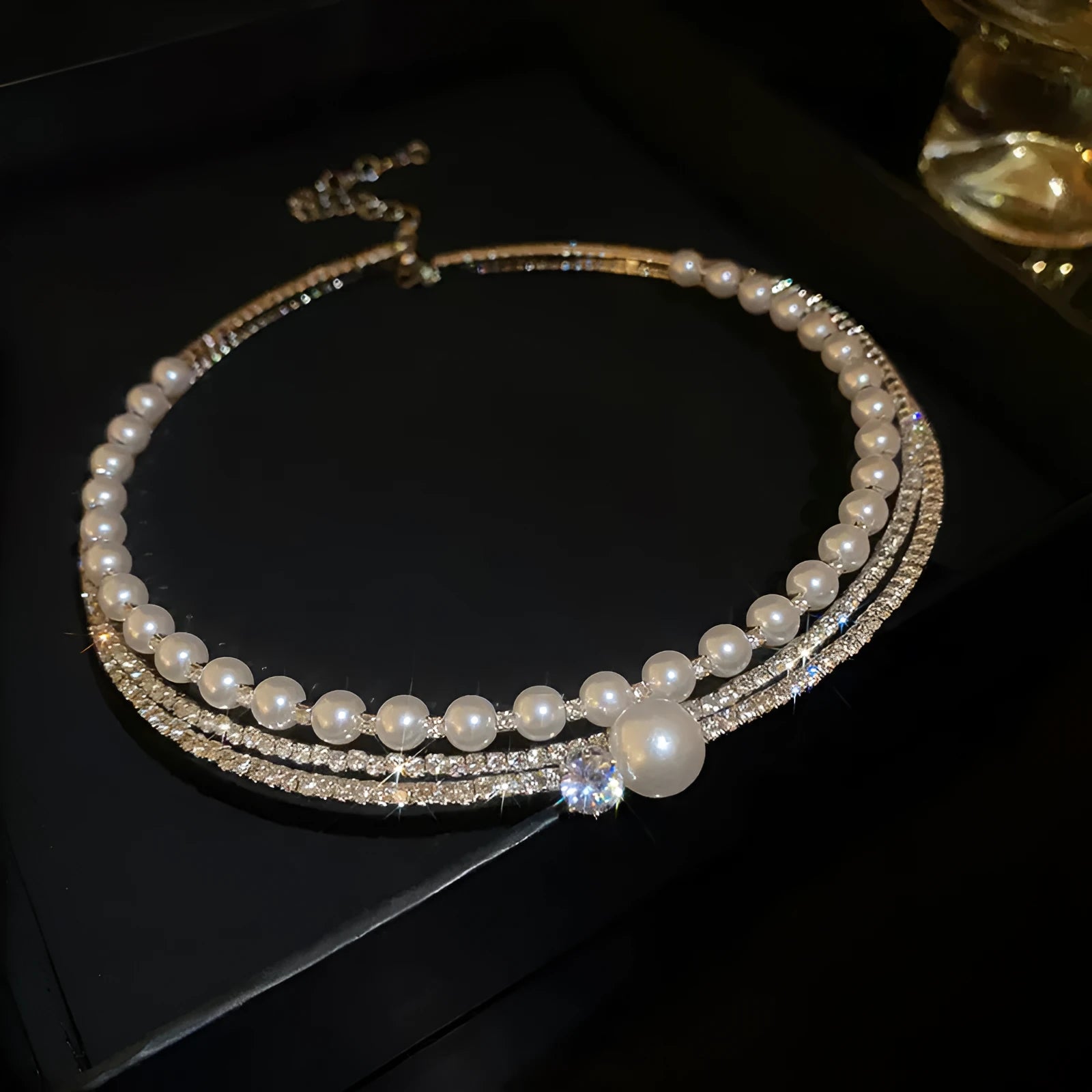 Silver curved necklace with exaggerated collarbone design and round geometry pendant