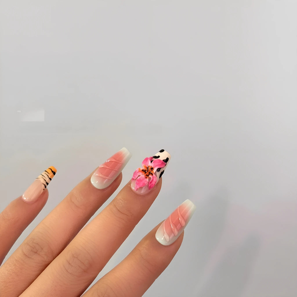 Hand-carved zebra pattern lily nail art set showing floral, leopard print and embossed designs in multiple sizes
