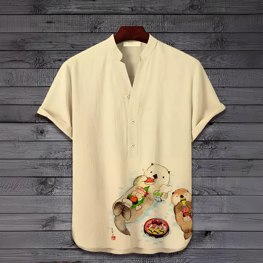 Man wearing a short sleeve t-shirt with a colourful 3D digital animal graphic print on the front.