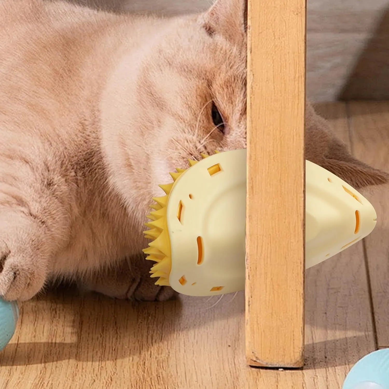 Yellow durian-shaped cat corner scratcher and massage comb toy with adhesive backing