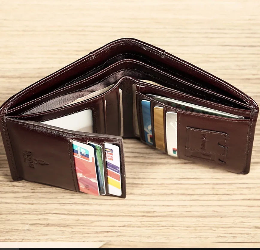 Men's leather wallet showing multiple internal compartments including photo position, card slots and banknote folder