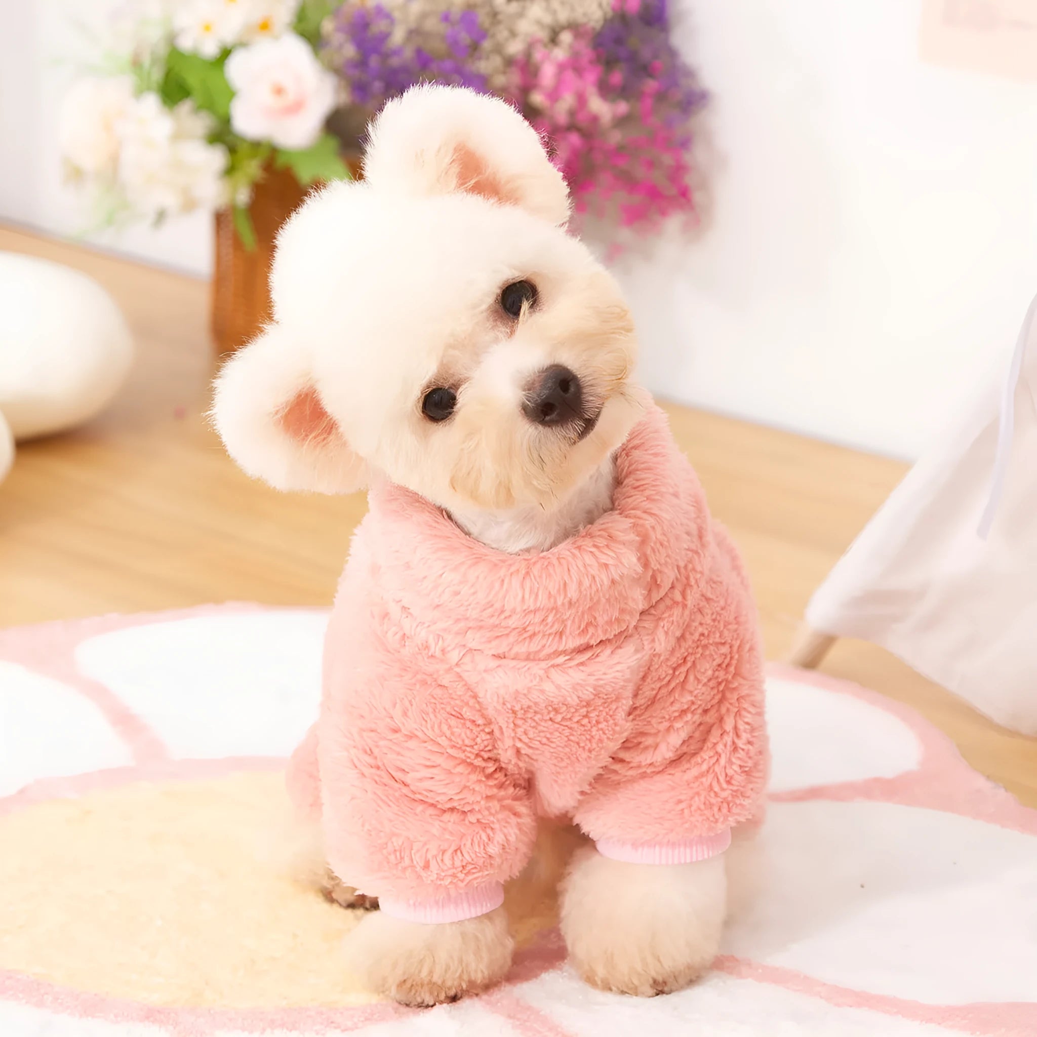 Blue double-sided plush dog clothes with high collar and towing ring on a mannequin.