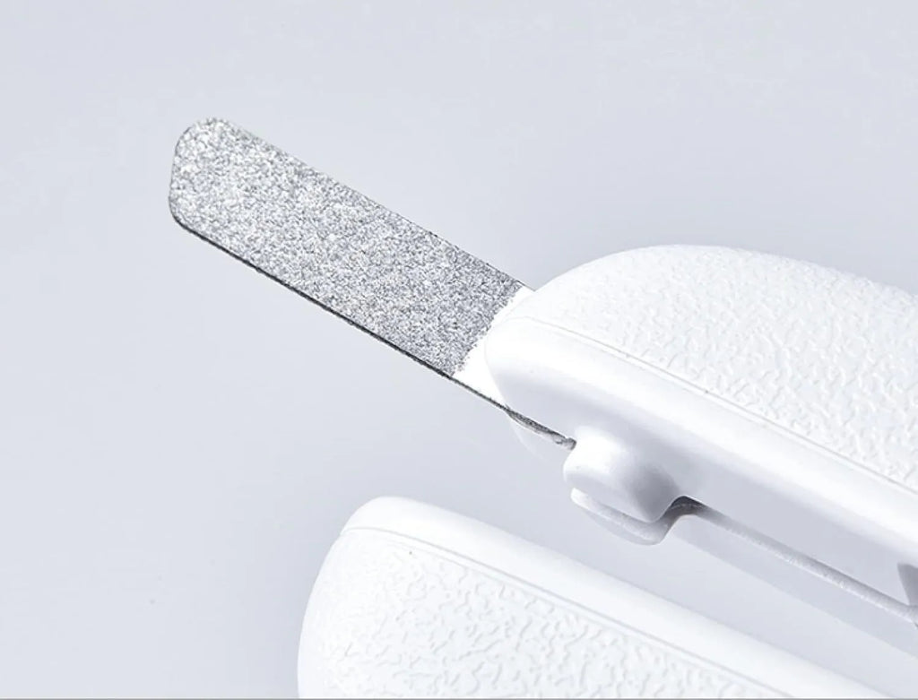 White LED pet nail clipper with transparent anti-splash guard and nail file.