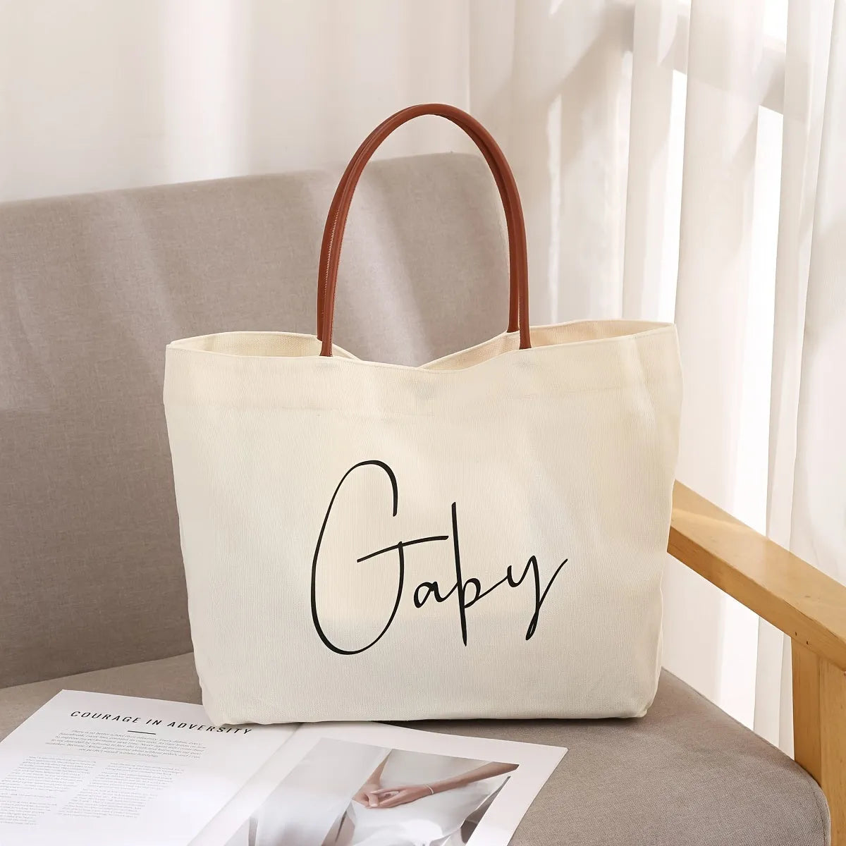 Heavy-duty natural cotton canvas tote bag with flat base and long handles in beige white colour.