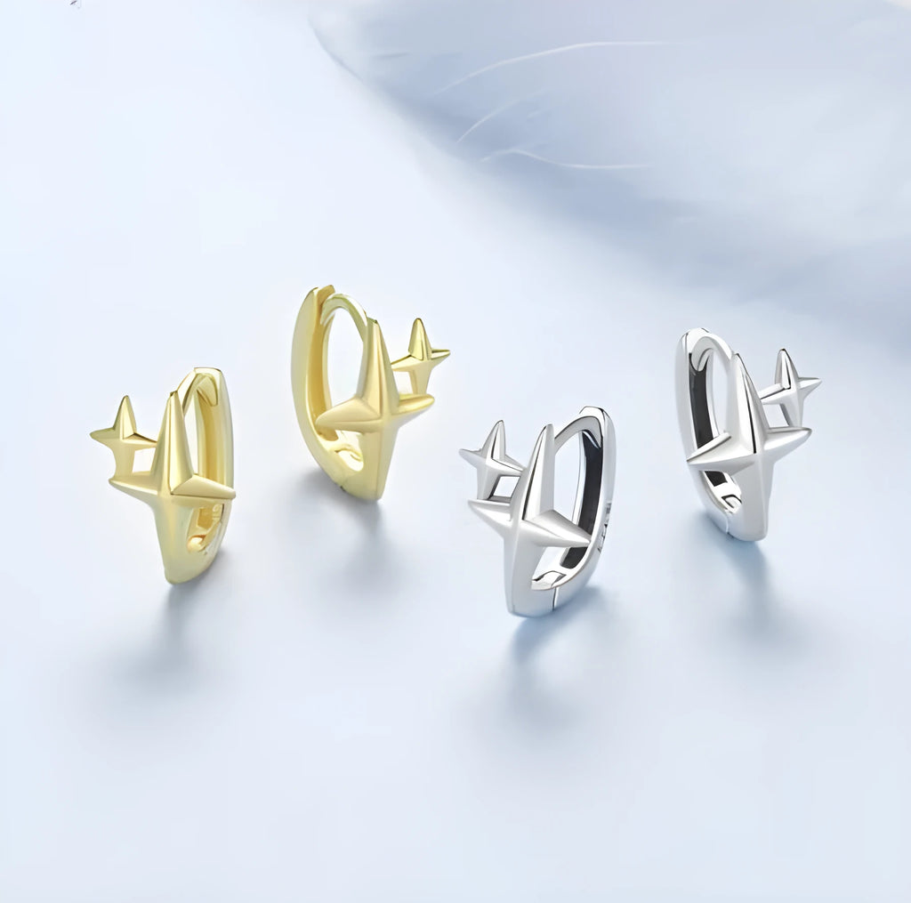 Minimalist oxidised sterling silver star ear clip with XINGX element.