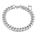Six-sided Cuban link metal bracelet in gold, black, and steel colour finishes on a wrist.