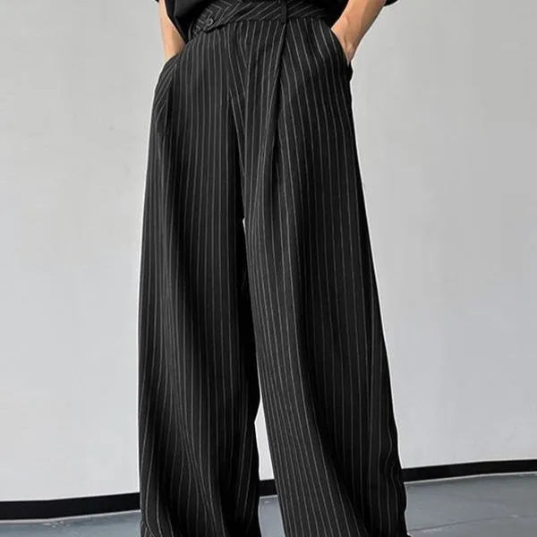 Black men's casual trousers with vertical stripes and front pleats, made from a soft rabbit hair and bamboo fibre blend.