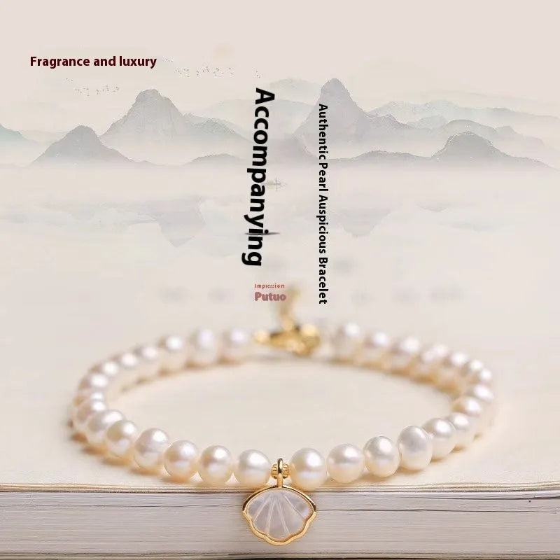 Women's freshwater pearl bracelet with fan-shaped design and alloy clasp, 16cm long.