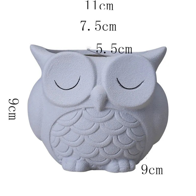 Handmade frosted ceramic flower pot with a cartoon owl design for succulents.