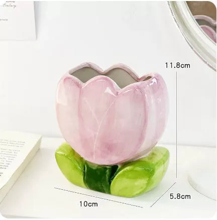 Ceramic desktop pen holder box with floral design in blue, pink, or purple.