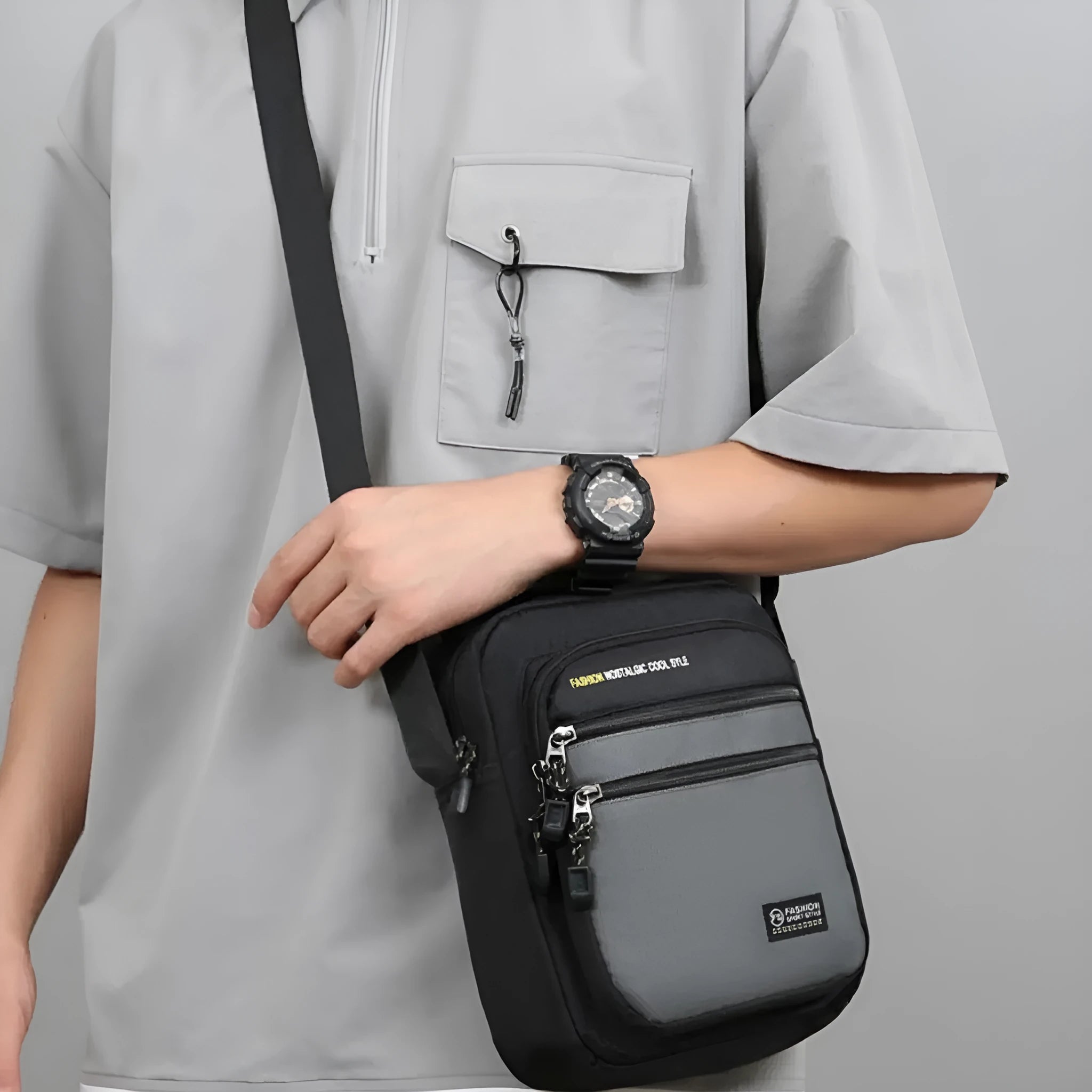Men's nylon crossbody bag in solid colour with crossbody strap and storage compartments.