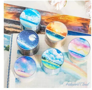 Roll of Japanese washi tape with sky theme designs including clouds, sun, moon, and nebula on a 30mm wide format.