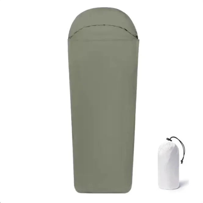 Blue lightweight nylon mummy-style camping sleeping bag for adults, shown packed