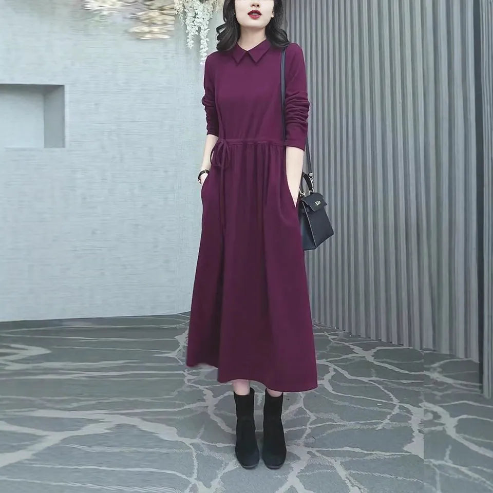 Purplish red women's long sleeve midi dress for winter, shown in a plus size.