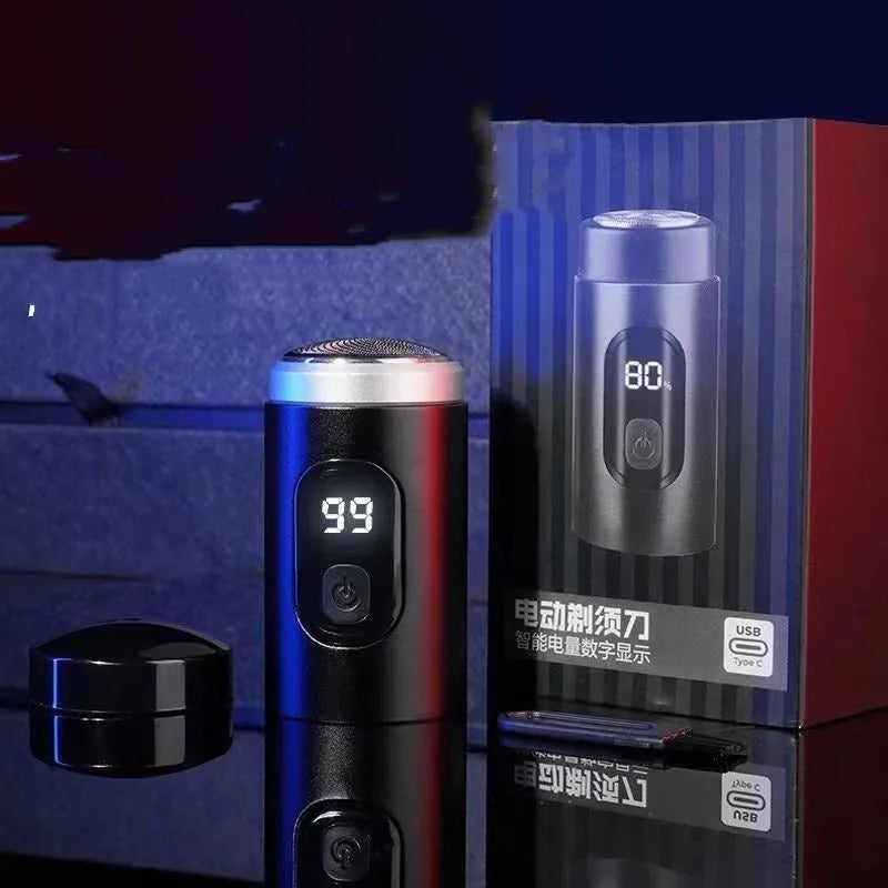 Black portable USB rechargeable electric shaver with LED display, shown with its cleaning brush and protective cover.
