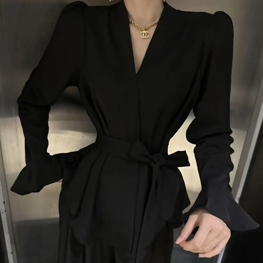 Women's French-style shirt with irregular collar, bell sleeves, and tied front in polyester fabric