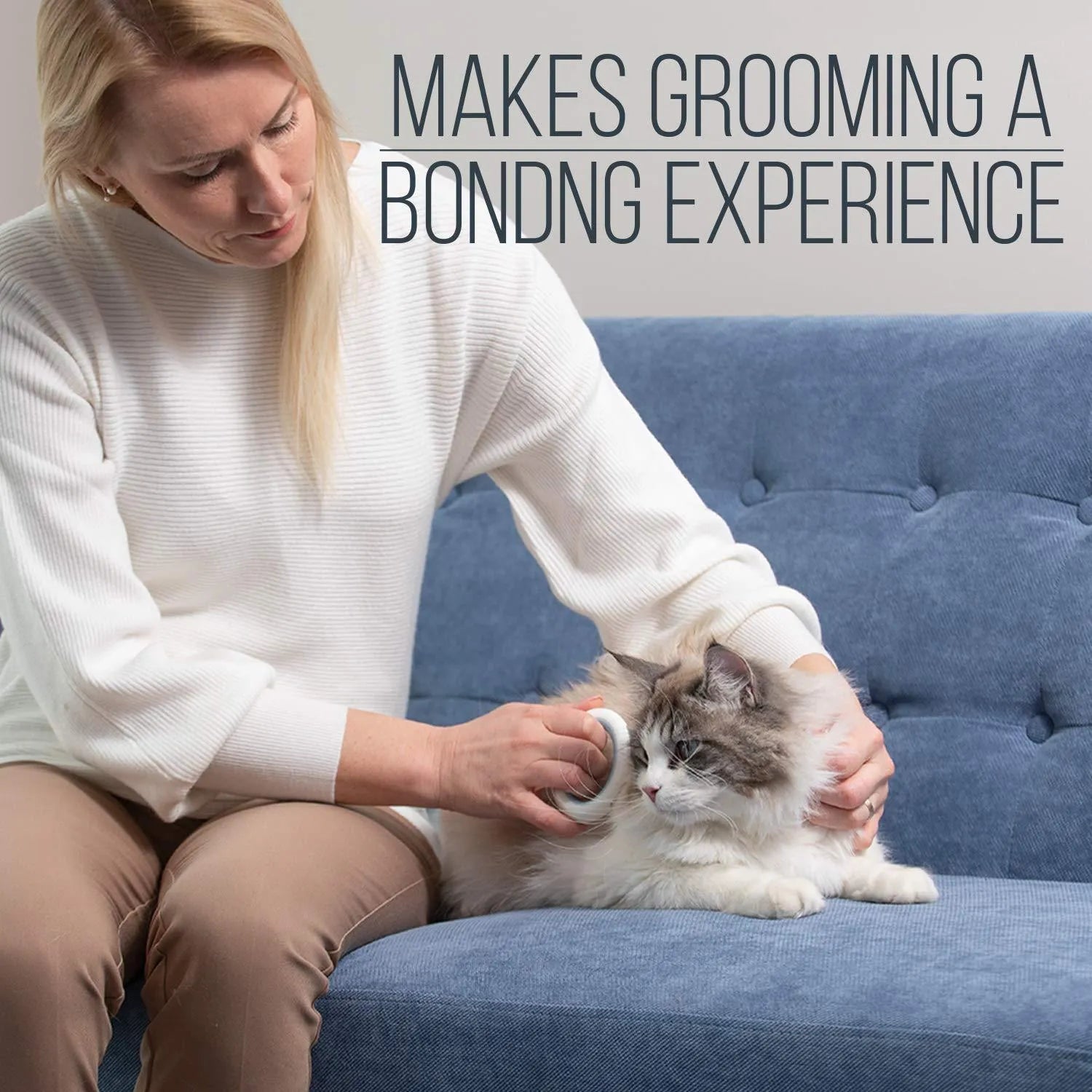 Blue pet deshedding comb with soft teeth and ergonomic plastic handle for grooming cats and dogs.