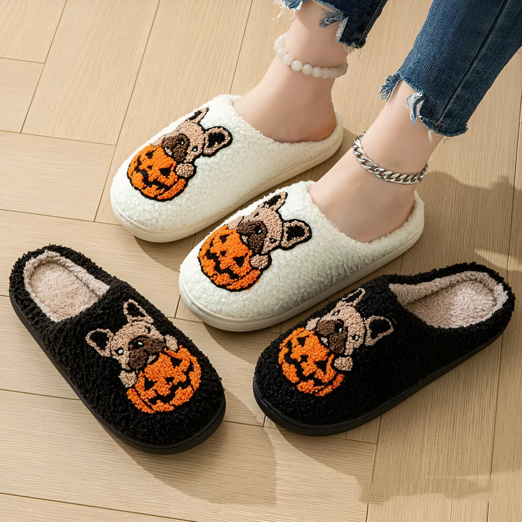 Black and white Halloween pumpkin plush slippers with TPR rubber soles in multiple sizes
