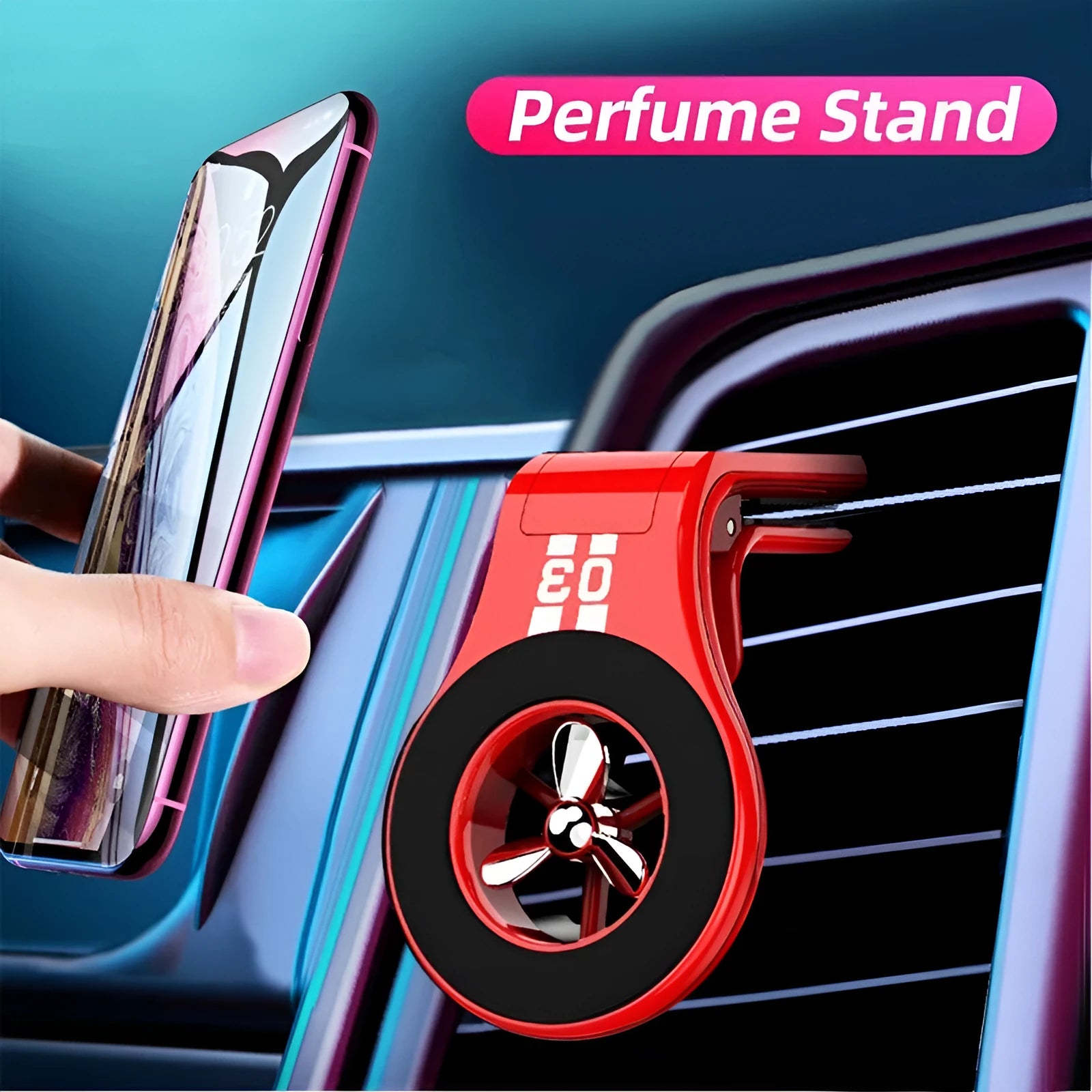 Black magnetic car phone holder clipped to car air vent with smartphone attached and fragrance pads