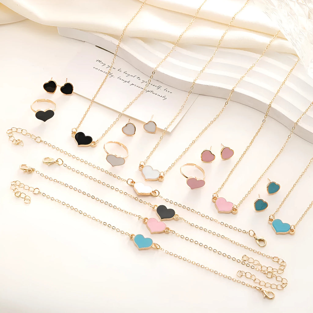 Women's four-piece jewellery set with heart pattern necklace, bracelet, ring and earrings in electroplated alloy