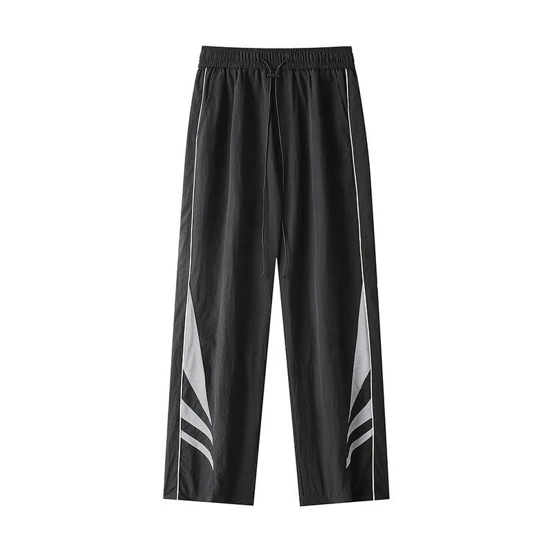 Men's straight leg casual trousers in grey, featuring an elasticated waistband and a loose fit.