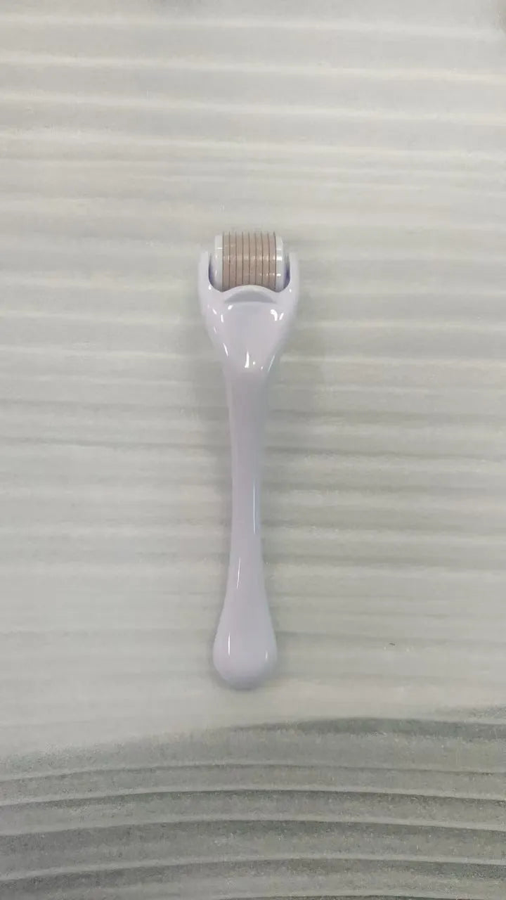 540 Micro Needle Roller device with mechanical font size display showing needle specification