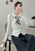 Lapel scarf cardigan sweater in acrylic, shown in milky white, grey, black, and navy blue colour options.
