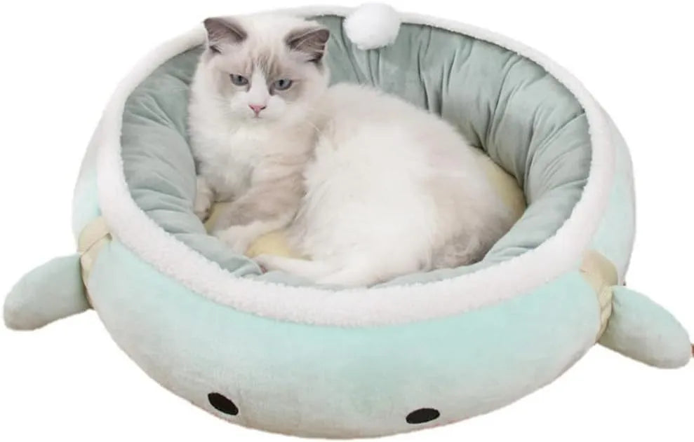 Green chick dinosaur shaped cat bed that can be used flat or hung as a hammock