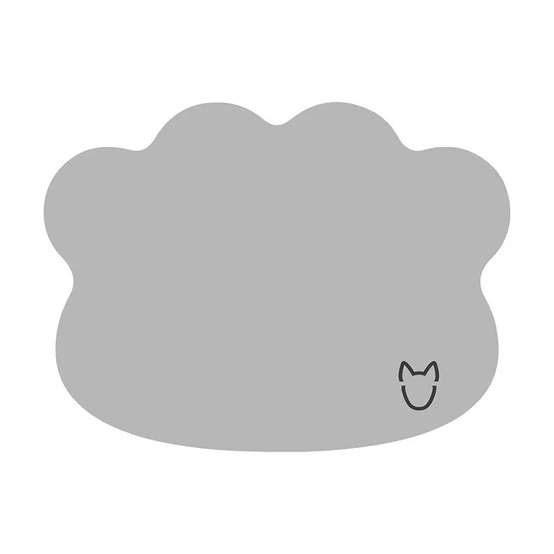 Light grey dog head shaped ice silk cooling mat for pets on a wooden floor